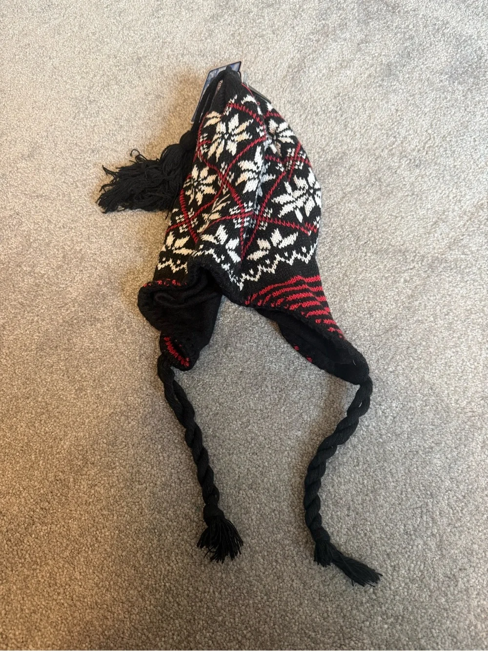 Kids Black, White & Red Knit Earflap Hat with Tassels snowflake and red detailin